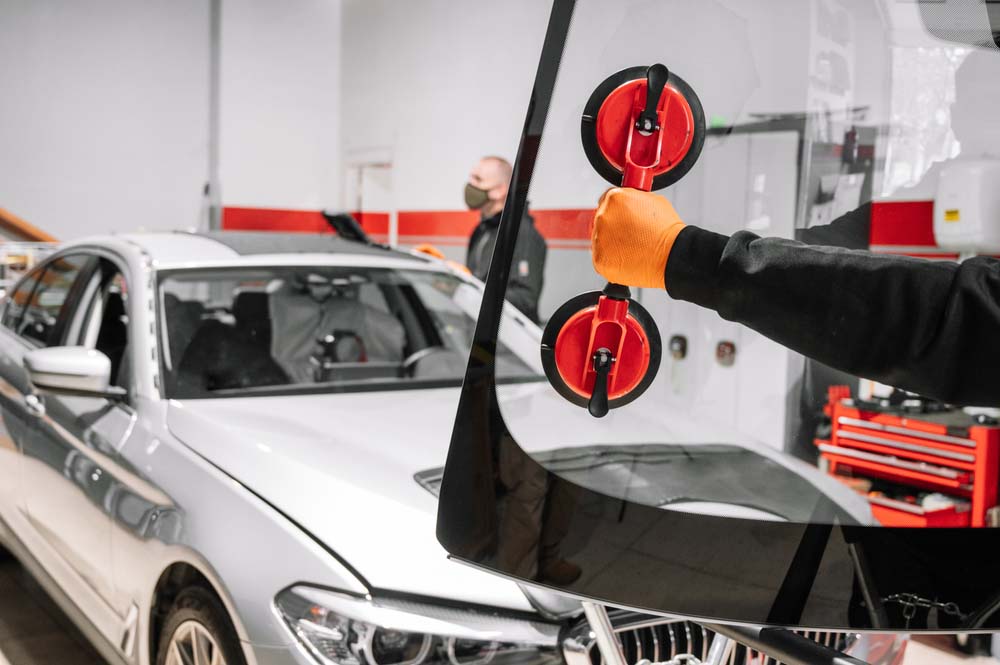 mechanic installing windshield Flagstaff, AZ