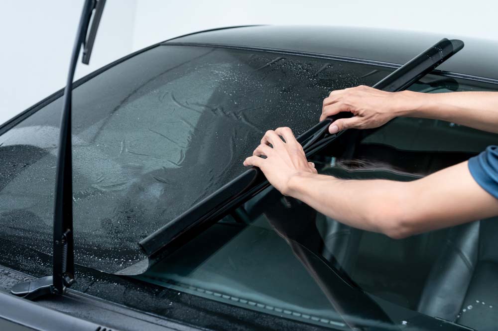 car with dash mats and tinting
